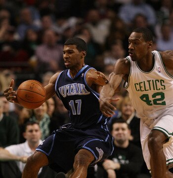 BOSTON - DECEMBER 15:  Ronnie Price #17 of the Utah Jazz tries to maintain control of the ball as Tony Allen #42 of the Boston Celtics tries to steal on December 15, 2008 at TD Banknorth Garden in Boston, Massachusetts. The Celtics defeated the Jazz 100-9