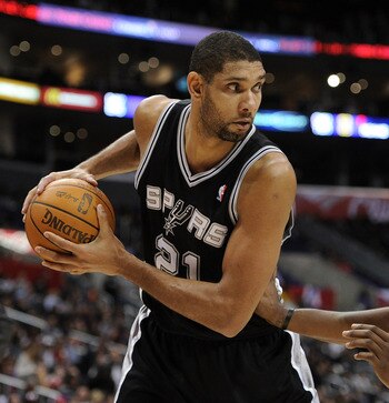 LOS ANGELES, CA - DECEMBER 01:  Tim Duncan #21 of the San Antonio Spurs pauses with the ball in front of DeAndre Jordan #9 of the Los Angeles Clippers at the Staples Center on December 1, 2010 in Los Angeles, California.  NOTE TO USER: User expressly ackn