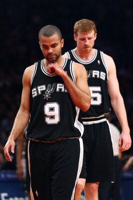 NEW YORK - FEBRUARY 17:  Tony Parker #9 and Matt Bonner #15 of the San Antonio Spurs walk up the court against the New York Knicks at Madison Square Garden February 17, 2009 in New York City. NOTE TO USER: User expressly acknowledges and agrees that, by d