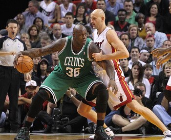 MIAMI - NOVEMBER 11:  Shaquille O'Neal #36 of the Boston Celtics is guarded by Zydrunas Ilgauskas #11 during a game against the Miami Heat at American Airlines Arena on November 11, 2010 in Miami, Florida. NOTE TO USER: User expressly acknowledges and agr