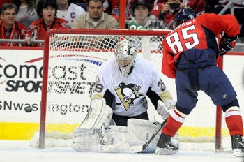 WASHINGTON, DC - DECEMBER 23:  Marc-Andre Fleury #29 of the Pittsburgh Penguins makes a save during the shootout against Mathieu Perreault #85 of the Washington Capitals at the Verizon Center on December 23, 2010 in Washington DC.  (Photo by Greg Fiume/Ge