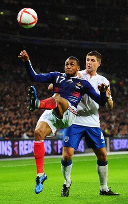 LONDON, ENGLAND - NOVEMBER 17:  Steven Gerrard of England is beaten to the ball by Yann M'Vila of France during the international friendly match between England and France at Wembley Stadium on November 17, 2010 in London, England.  (Photo by Mike Hewitt/