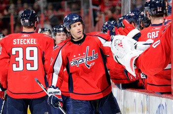 WASHINGTON, DC - DECEMBER 15:  Brooks Laich #21 of the Washington Capitals celebrates with teammates after scoring in the first period against the Anaheim Ducks at the Verizon Center on December 15, 2010 in Washington, DC.  (Photo by Greg Fiume/Getty Imag