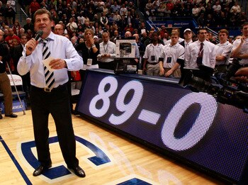 HARTFORD, CT - DECEMBER 21:  Coach Geno Auriemma of Connecticut celebrates a win over  Florida State on December 21, 2010 in Hartford, Connecticut.  Connecticut set a record with 89 straight wins without a defeat. (Photo by Jim Rogash/Getty Images)