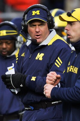 COLUMBUS, OH - NOVEMBER 27:  Head Coach Rich Rodriguez of the Michigan Wolverines watches one of his assistants send in a play against the Ohio State Buckeyes at Ohio Stadium on November 27, 2010 in Columbus, Ohio.  (Photo by Jamie Sabau/Getty Images)