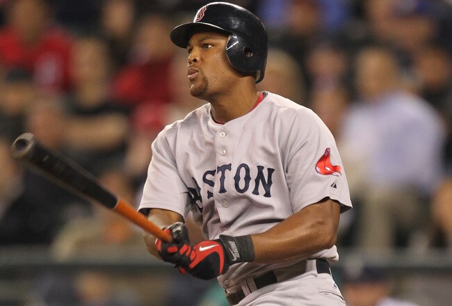 SEATTLE - SEPTEMBER 14:  Adrian Beltre #29 of the Boston Red Sox singles against the Seattle Mariners at Safeco Field on September 14, 2010 in Seattle, Washington. The Red Sox won 9-6. (Photo by Otto Greule Jr/Getty Images)