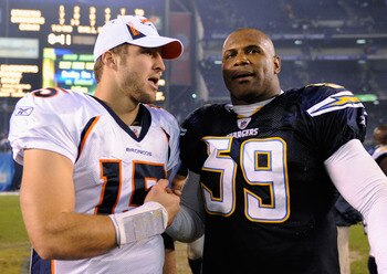 SAN DIEGO - NOVEMBER 22:  Quarterback Tim Tebow #15 of the Denver Broncos and Wesley Woodyard #59 of the San Diego Chargers greet after the football game at Qualcomm Stadium on November 22, 2010 in San Diego, California.  (Photo by Kevork Djansezian/Getty