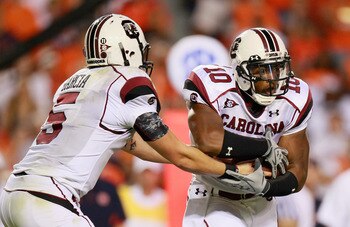AUBURN, AL - SEPTEMBER 25:  Quarterback Stephen Garcia #5 and Brian Maddox #10 of the South Carolina Gamecocks against the Auburn Tigers at Jordan-Hare Stadium on September 25, 2010 in Auburn, Alabama.  (Photo by Kevin C. Cox/Getty Images)