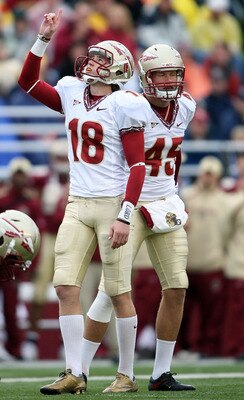 CHESTNUT HILL, MA - OCTOBER 03:  Dustin Hopkins #18 of the Florida State Seminoles celebrates his field goal as teammate Shawn Powell #45 looks on in the first half against the Boston College Eagles on October 3, 2009 at Alumni Stadium in Chestnut Hill, M