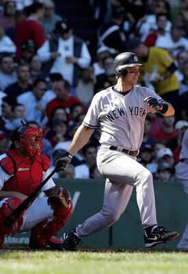 BOSTON - OCTOBER 01:  Tino Martinez #24 of the New York Yankees hits a base hit to lead off the second inning against the Boston Red Sox at Fenway Park on October 1, 2005 in Boston, Massachusetts.  (Photo by Jim McIsaac/Getty Images)