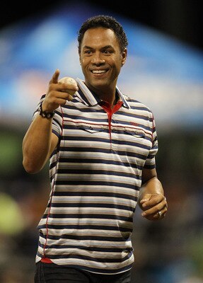 SAN JUAN, PUERTO RICO - JUNE 30:  Roberto Alomar Jr. throws out the first pitch before the game between the New York Mets and the Florida Marlins  during their game at Hiram Bithorn Stadium on June 30, 2010 in San Juan, Puerto Rico.  (Photo by Al Bello/Ge