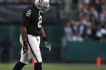 OAKLAND, CA - JANUARY 03:  JaMarcus Russell #2 of the Oakland Raiders walks off the field against the Baltimore Ravens during an NFL game at Oakland-Alameda County Coliseum on January 3, 2010 in Oakland, California.  (Photo by Jed Jacobsohn/Getty Images)