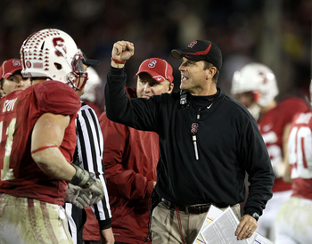 PALO ALTO, CA - NOVEMBER 27:  Head coach Jim Harbaugh of the Stanford Cardinal reacts after Delano Howell #26 of the Stanford Cardinal made an interception on a pass intended for Joe Halahuni #87 of the Oregon State Beavers at Stanford Stadium on November