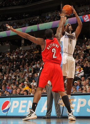 DENVER - DECEMBER 28:  Chauncey Billups #1 of the Denver Nuggets takes a shot over Wesley Matthews #2 of the Portland Trail Blazers at Pepsi Center on December 28, 2010 in Denver, Colorado. The Nuggets defeated the Blazers 95-77. NOTE TO USER: User expres