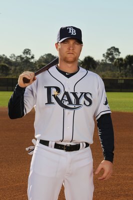 PORT CHARLOTTE, FL - FEBRUARY 26:  Dan Johnson #24 of the Tampa Bay Rays poses for a photo during Spring Training Media Photo Day at Charlotte County Sports Park on February 26, 2010 in Port Charlotte, Florida.  (Photo by Nick Laham/Getty Images)