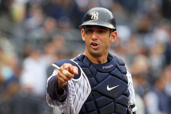 NEW YORK - OCTOBER 20:  Jorge Posada #20 of the New York Yankees gestures towards the dugout against the Texas Rangers in Game Five of the ALCS during the 2010 MLB Playoffs at Yankee Stadium on October 20, 2010 in the Bronx borough of New York City.  (Pho