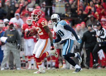 KANSAS CITY, MO - DECEMBER 26:  Receiver Dwayne Bowe #82 of the Kansas City Chiefs carries the ball after making a catch on a 75 yard touchdown play during the game against the Tennessee Titans on December 26, 2010 at Arrowhead Stadium in Kansas City, Mis