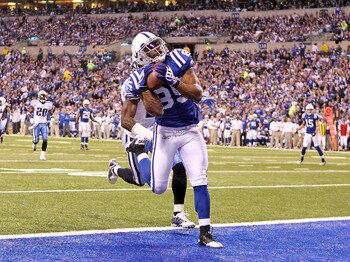 INDIANAPOLIS - JANUARY 02: Pierre Garcon #85 of the Indianapolis Colts catches a touchdown pass during NFL game against the Tennessee Titans at Lucas Oil Stadium on January 2, 2011 in Indianapolis, Indiana.  The Colts won 23-20.(Photo by Andy Lyons/Getty
