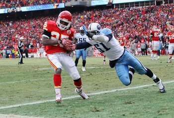 KANSAS CITY, MO - DECEMBER 26:  Jamaal Charles #25 of the Kansas City Chiefs makes a catch in the endzone for a touchdown as Gerald McRath #51 of the Tennessee Titans defends during the game on December 26, 2010 at Arrowhead Stadium in Kansas City, Missou