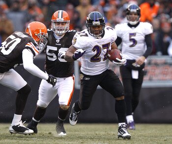 CLEVELAND - DECEMBER 26:  Running back Ray Rice #27 of the Baltimore Ravens runs by linebackers Eric Barton #50 and Matt Roth #53 of the Cleveland Browns at Cleveland Browns Stadium on December 26, 2010 in Cleveland, Ohio.  (Photo by Matt Sullivan/Getty I