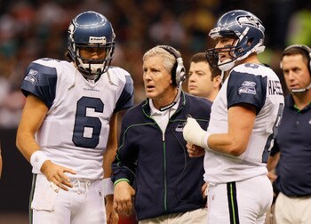 NEW ORLEANS - NOVEMBER 21:  Head coach Pete Carroll, quarterbacks Matt Hasselbeck #8 and Charlie Whitehurst #6 of the Seattle Seahawks against the New Orleans Saints at Louisiana Superdome on November 21, 2010 in New Orleans, Louisiana.  (Photo by Kevin C