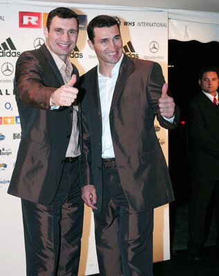 MUNICH, GERMANY - MARCH 31: Boxer Wladimir Klitschko (L) and Vitali Klitschko attend the cruiserweight fight of Henry Maske against Virgil Hill at the Olympic Hall on March 31, 2007 in Munich, Germany. (Photo by Theo Klein/Getty Images)