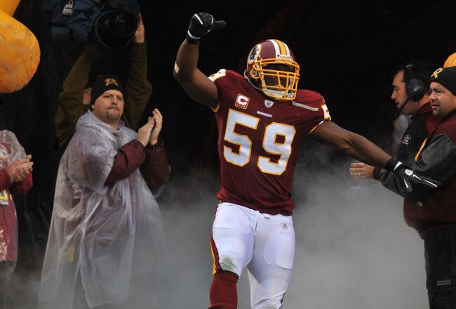 LANDOVER, MD - DECEMBER 12:  London Fletcher #59 of the Washington Redskins is introduced before the game against the Tampa Bay Buccaneers  at FedExField on December 12, 2010 in Landover, Maryland. The Buccaneers defeated the Redskins 17-16. (Photo by Lar