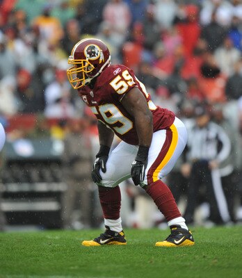 LANDOVER, MD - DECEMBER 12:  London Fletcher #59 of the Washington Redskins defends against the Tampa Bay Buccaneers  at FedExField on December 12, 2010 in Landover, Maryland. The Buccaneers defeated the Redskins 17-16. (Photo by Larry French/Getty Images