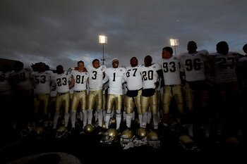 EL PASO, TX - DECEMBER 30:  The Notre Dame Fighting Irish celebrate a 33-17 win against the Miami Hurricanes at Sun Bowl on December 30, 2010 in El Paso, Texas.  (Photo by Ronald Martinez/Getty Images)