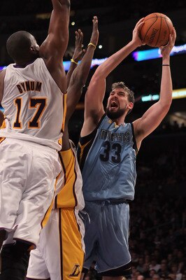 LOS ANGELES, CA - JANUARY 02:  Marc Gasol #33 of the Memphis Grizzlies drives to the basket while being defended by Andrew Bynum #17 of the Los Angeles Lakers during the first half at Staples Center on January 2, 2011 in Los Angeles, California. The Grizz