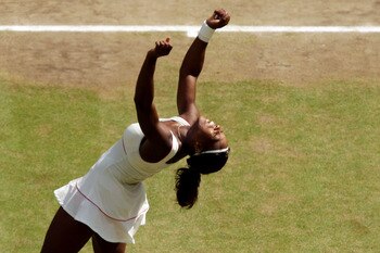 LONDON, ENGLAND - JULY 03:  Serena Williams of USA celebrates Championship point after winning her Ladies Singles Final Match against Vera Zvonareva of Russia on Day Twelve of the Wimbledon Lawn Tennis Championships at the All England Lawn Tennis and Croq