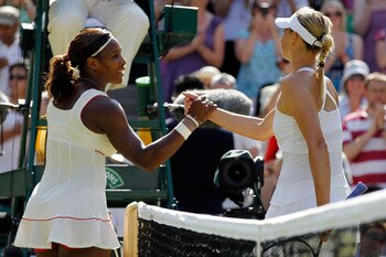 LONDON, ENGLAND - JUNE 28:  Serena Williams of USA (L) celebrates match point after her match against Maria Sharapova of Russia (R) on Day Seven of the Wimbledon Lawn Tennis Championships at the All England Lawn Tennis and Croquet Club on June 28, 2010 in