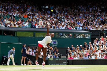 LONDON, ENGLAND - JULY 03:  Serena Williams of USA serves during the Ladies Singles Final Match against Vera Zvonareva of Russia on Day Twelve of the Wimbledon Lawn Tennis Championships at the All England Lawn Tennis and Croquet Club on July 3, 2010 in Lo