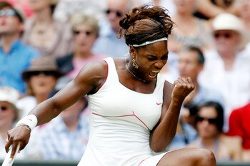 LONDON, ENGLAND - JULY 03:  Serena Williams of USA celebrates a point during the Ladies Singles Final Match against Vera Zvonareva of Russia on Day Twelve of the Wimbledon Lawn Tennis Championships at the All England Lawn Tennis and Croquet Club on July 3