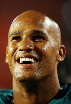 MIAMI - AUGUST 22:  Linebacker Jason Taylor #99 of the Miami Dolphins celebrates after fullback Joe Kowalewski #40 scored a touchdown against the Carolina Panthers during a pre-season game at Land Shark Stadium on August 22, 2009 in Miami, Florida. The Do
