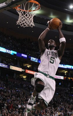 BOSTON, MA - DECEMBER 08:  Kevin Garnett #5 of the Boston Celtics dunks the ball in the first half against the Denver Nuggets on December 8, 2010 at the TD Garden in Boston, Massachusetts. NOTE TO USER: User expressly acknowledges and agrees that, by down