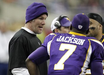 DETROIT, MI - DECEMBER 13:  Brett Favre #4 of the Minnesota Vikings talks to Tavaris Jackson #7 on the bench while playing the New York Giants at Ford Field on December 13, 2010 in Detroit, Michigan.  (Photo by Gregory Shamus/Getty Images)