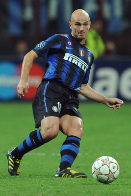 MILAN, ITALY - SEPTEMBER 29:  Esteban Matias Cambiasso of FC Internazionale Milano shoots the ball during the UEFA Champions League group A match between FC Internazionale Milano and SV Werder Bremen at Stadio Giuseppe Meazza on September 29, 2010 in Mila