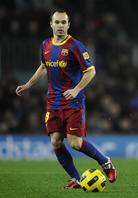 BARCELONA, SPAIN - JANUARY 02:  Andres Iniesta of Barcelona runs with the ball during the La Liga match between Barcelona and Levante UD at Camp Nou on January 2, 2011 in Barcelona, Spain. Barcelona won 2-1.  (Photo by David Ramos/Getty Images)