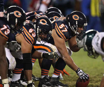 CHICAGO - NOVEMBER 28: (L-R) J'Marcus Webb #73 and Roberto Garza #63 of the Chicago Bears await the snap of Olin Kreutz #57 against the Philadelphia Eagles at Soldier Field on November 28, 2010 in Chicago, Illinois. The Bears defeated the Eagles 31-26. (P