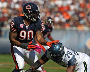 CHICAGO - OCTOBER 17: Julius Peppers #90 of the Chicago Bears rushes against Russell Okung #76 of the Seattle Seahawks at Soldier Field on October 17, 2010 in Chicago, Illinois. The Seahawks defeated the Bears 23-20. (Photo by Jonathan Daniel/Getty Images