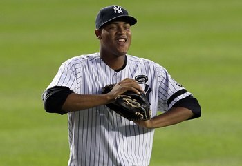 NEW YORK - SEPTEMBER 20:  Ivan Nova #47 of the New York Yankees warms up before playing against the Tampa Bay Rays on September 20, 2010 at Yankee Stadium in the Bronx borough of New York City.  (Photo by Jim McIsaac/Getty Images)