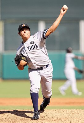 SCOTTSDALE, AZ - OCTOBER 23:  New York Yankees prospect Manuel Banuelos playing for the Phoenix Desert Dogs pitches against the Scottsdale Scorpions during the AZ Fall League game at Scottsdale Stadium on October 23, 2010 in Scottsdale, Arizona.  (Photo b