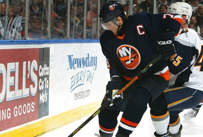 UNIONDALE, NY - APRIL 18:  Alexei Yashin #79 of the New York Islanders skates with the puck during Game 4 of the 2007 Eastern Conference Quarterfinals against  the Buffalo Sabres on April 18, 2007 at Nassau Coliseum in Uniondale, New York.  (Photo by Jim