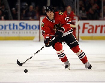 CHICAGO, IL - DECEMBER 30: Dave Bolland #36 of the Chicago Blackhawks skates up the ice against the San Jose Sharks at the United Center on December 30, 2010 in Chicago, Illinois. The Sharks defeated the Blackhawks 5-3. (Photo by Jonathan Daniel/Getty Ima