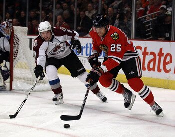 CHICAGO, IL - DECEMBER 15: Viktor Stalberg #25 of the Chicago Blackhawks controls the puck as Matt Duchene #9 of the Colorado Avalanche pursues at the United Center on December 15, 2010 in Chicago, Illinois. The Avalanche defeated the Blackhawks 4-3.  (Ph