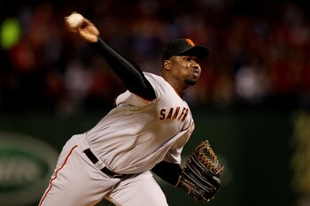 ARLINGTON, TX - OCTOBER 30:  Guillermo Mota #59 of the San Francisco Giants pitches against the Texas Rangers in Game Three of the 2010 MLB World Series at Rangers Ballpark in Arlington on October 30, 2010 in Arlington, Texas.  (Photo by Elsa/Getty Images