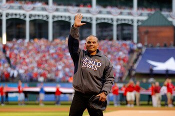 ARLINGTON, TX - OCTOBER 30: Former catcher for the Texas Rangers Ivan 'Pudge' Rodriguez waves to the fans as he walks out ot catch the cermonial firts pitch from Rangers team President Nolan Ryan against the San Francisco Giants in Game Three of the 2010