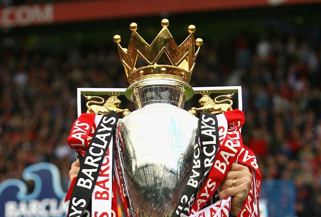 MANCHESTER, ENGLAND - MAY 16:  Sir Alex Ferguson the manager of Manchester United lifts the Barclays Premier League trophy after the Barclays Premier League match between Manchester United and Arsenal at Old Trafford on May 16, 2009 in Manchester, England