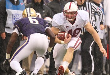 SEATTLE - OCTOBER 30:  Running back Owen Marecic #48 of the Stanford Cardinal rushes against Desmond Trufant #6 of the Washington Huskies on October 30, 2010 at Husky Stadium in Seattle, Washington. Stanford won 41-0. (Photo by Otto Greule Jr/Getty Images